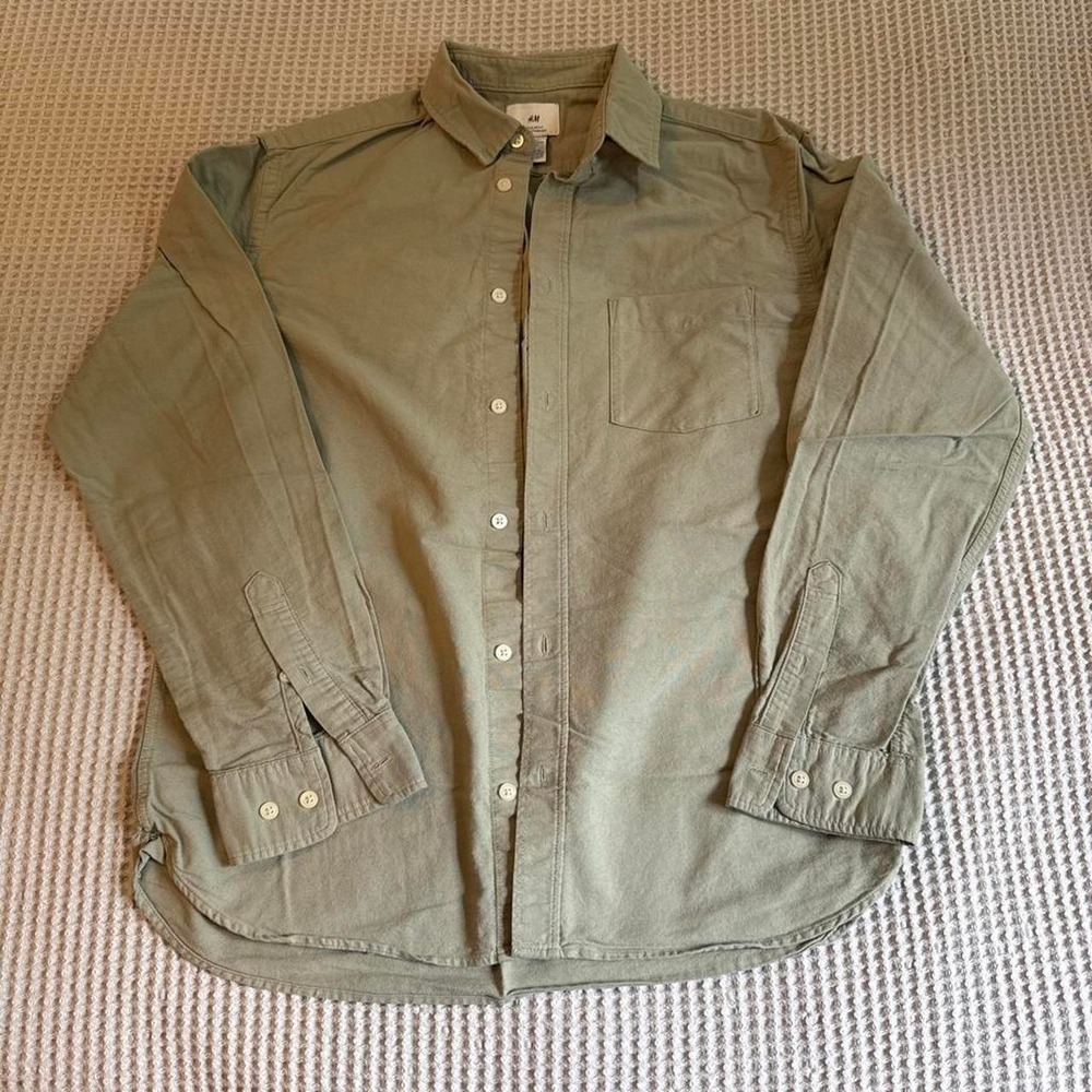 Green H&M button-up shirt with a relaxed fit